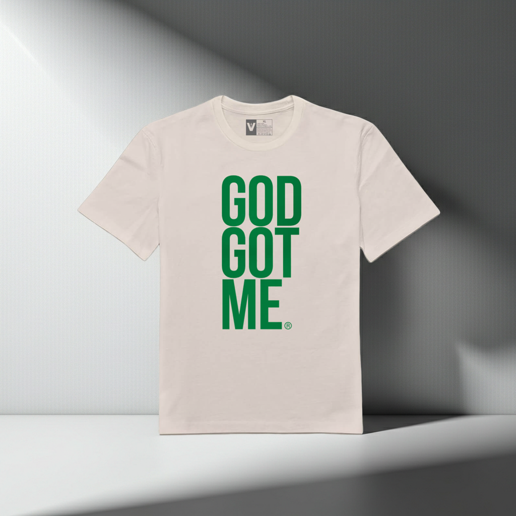 DIOS ME TIENE Camiseta naranja sobre blanca